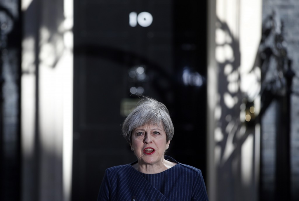 Britain's Prime Minister Theresa May arrives to speak to the media outside her official residence of 10 Downing Street in London, Tuesday April 18, 2017. British Prime Minister Theresa May announced she will seek early election on June 8 (AP Photo/Alastair Grant)