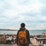 Man-with-backpack-in-Istanbul-Turkey-photo-by-Oziel-Gomez-via-Unsplash-300×215