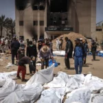 25mideast-crisis-mass-graves-01-tgkp-superJumbo